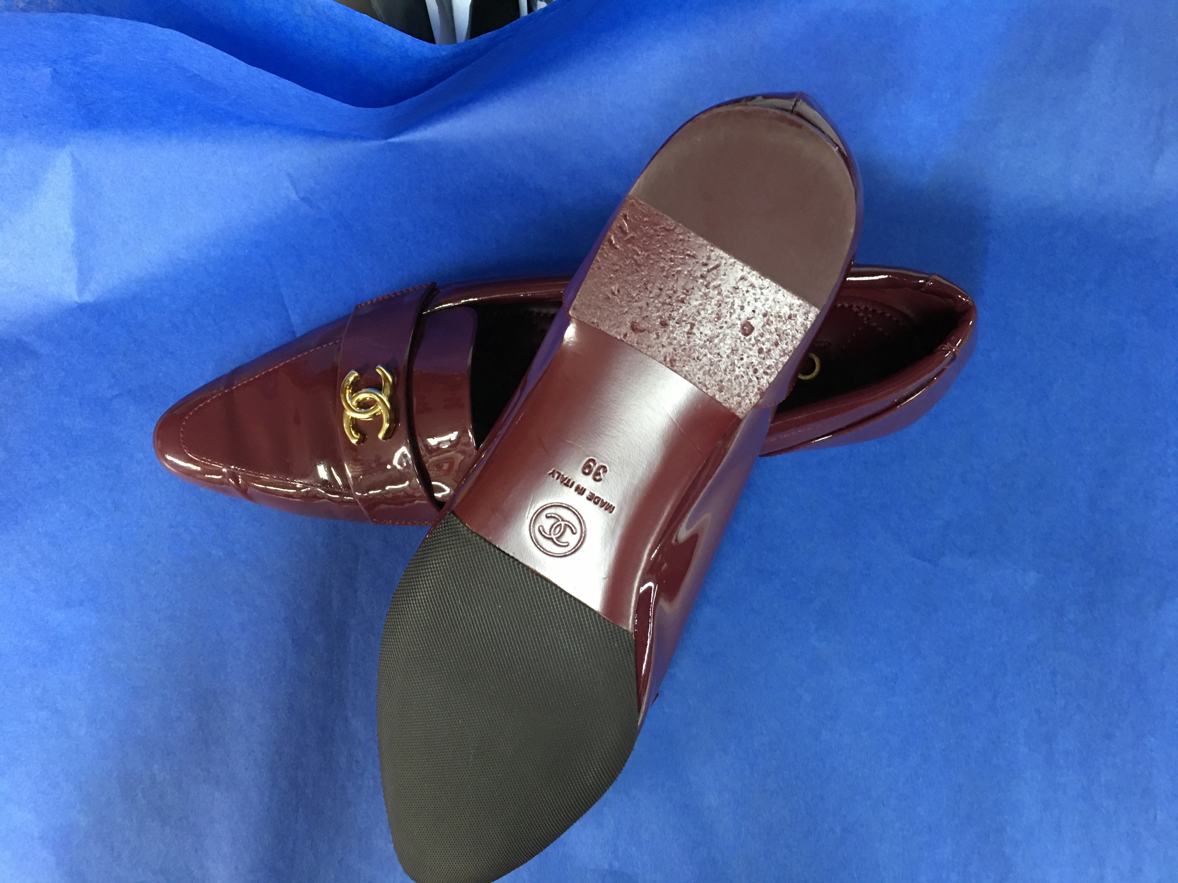 Burgundy Chanel patent pointed-toe flats