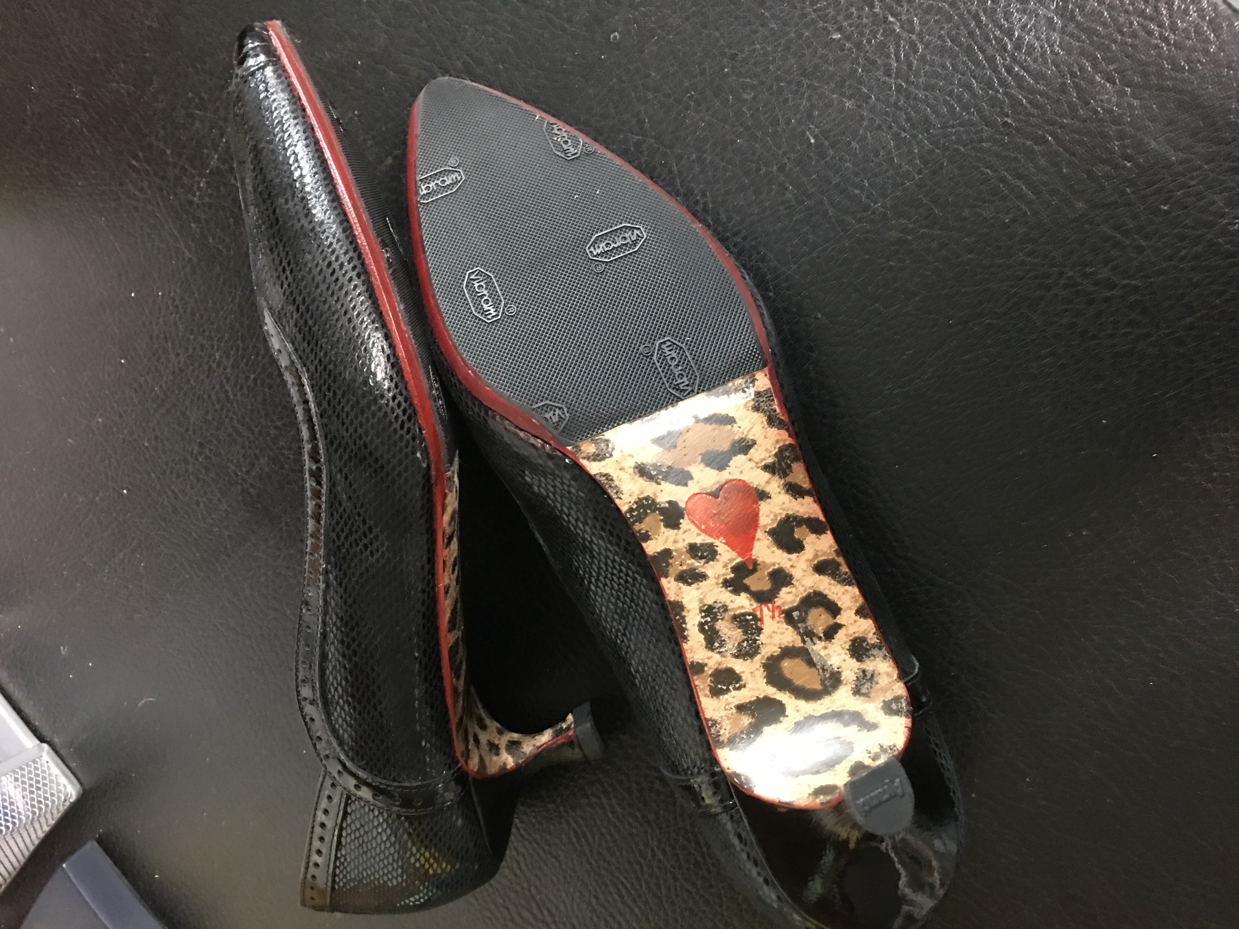 Black lizard-print heels Vibram sole restoration