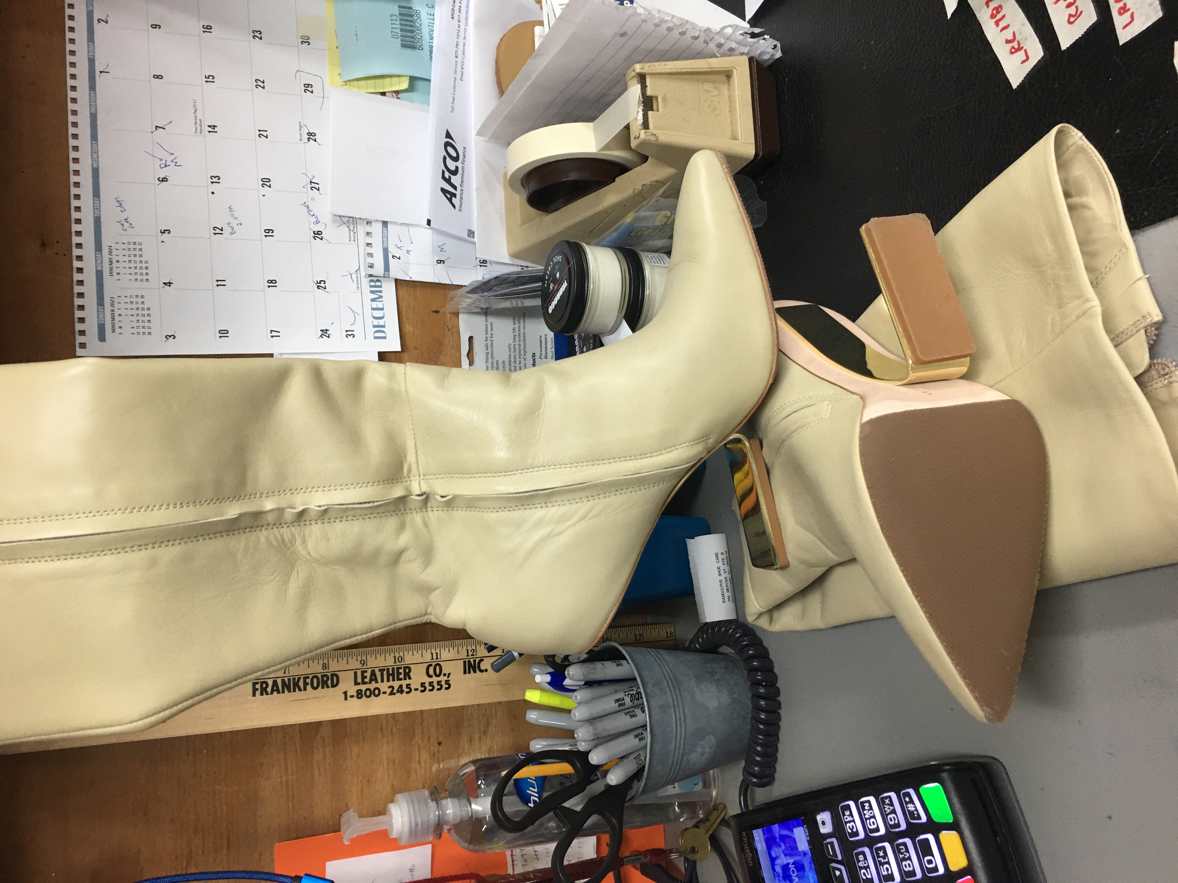 Cream knee-high boots leather restoration